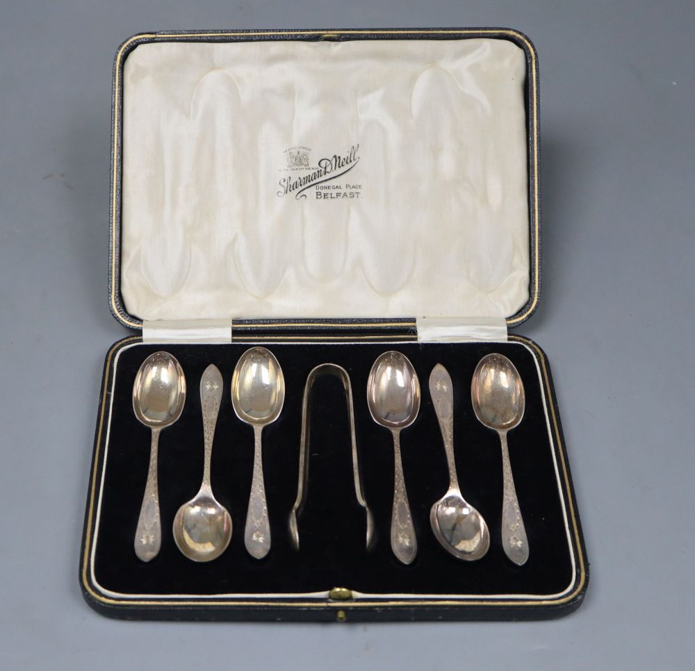 A George V cased set of six silver teaspoons, and pair of sugar tongs, Sheffield, 1924, 3oz.